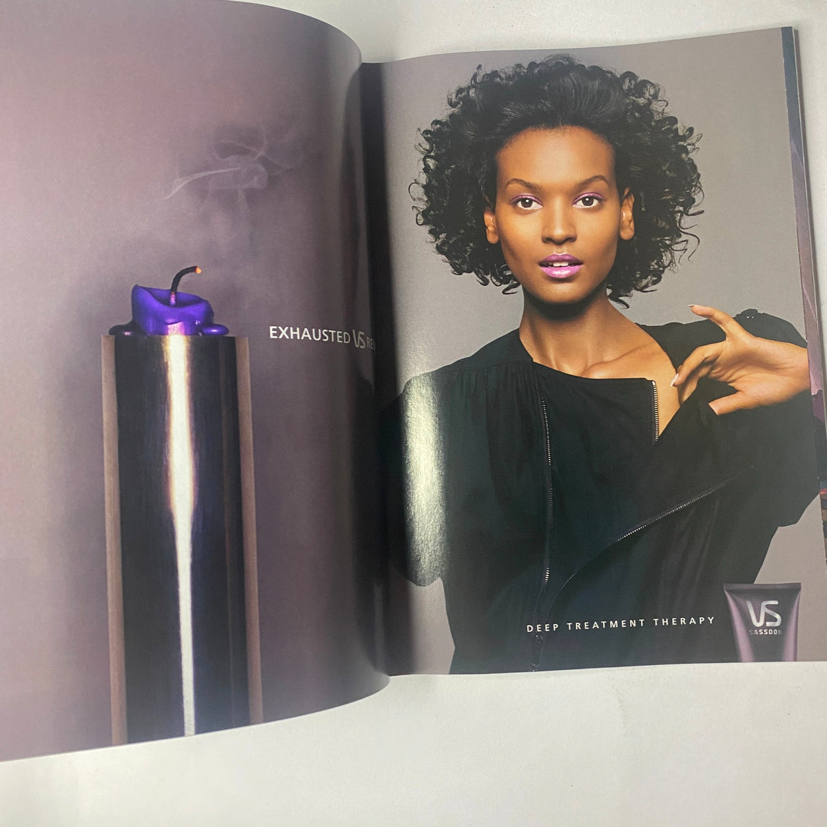 Vogue Magazine February 2001, featuring a fashion advertisement for VS styling products with a model showcasing deep treatment therapy.