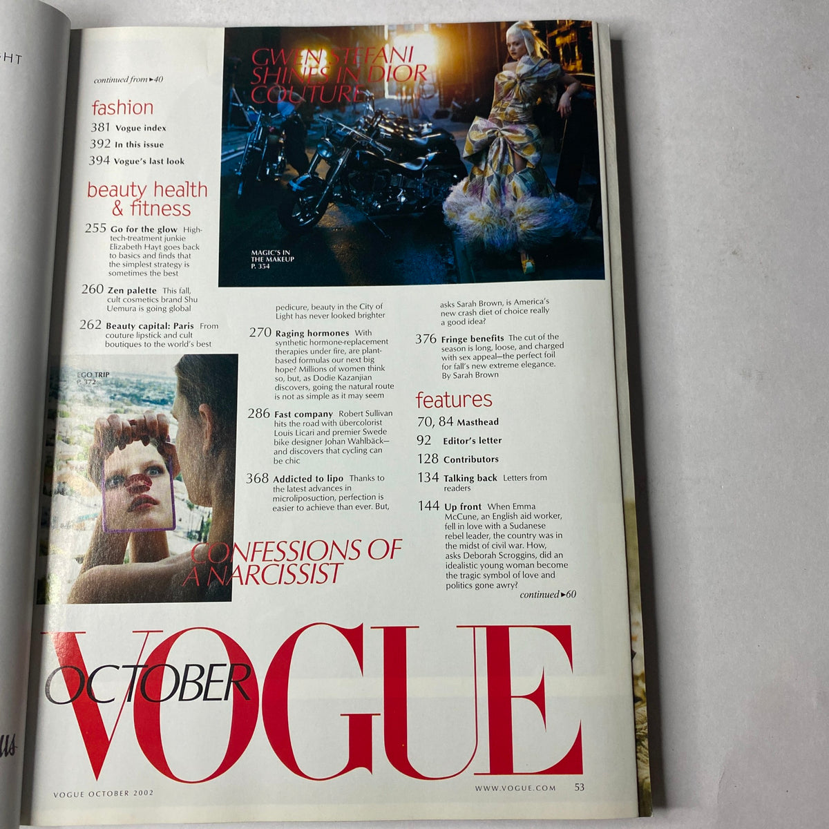 Interior page of October 2002 Vogue Magazine detailing beauty and health topics, including a feature on hormone therapy and global beauty trends.