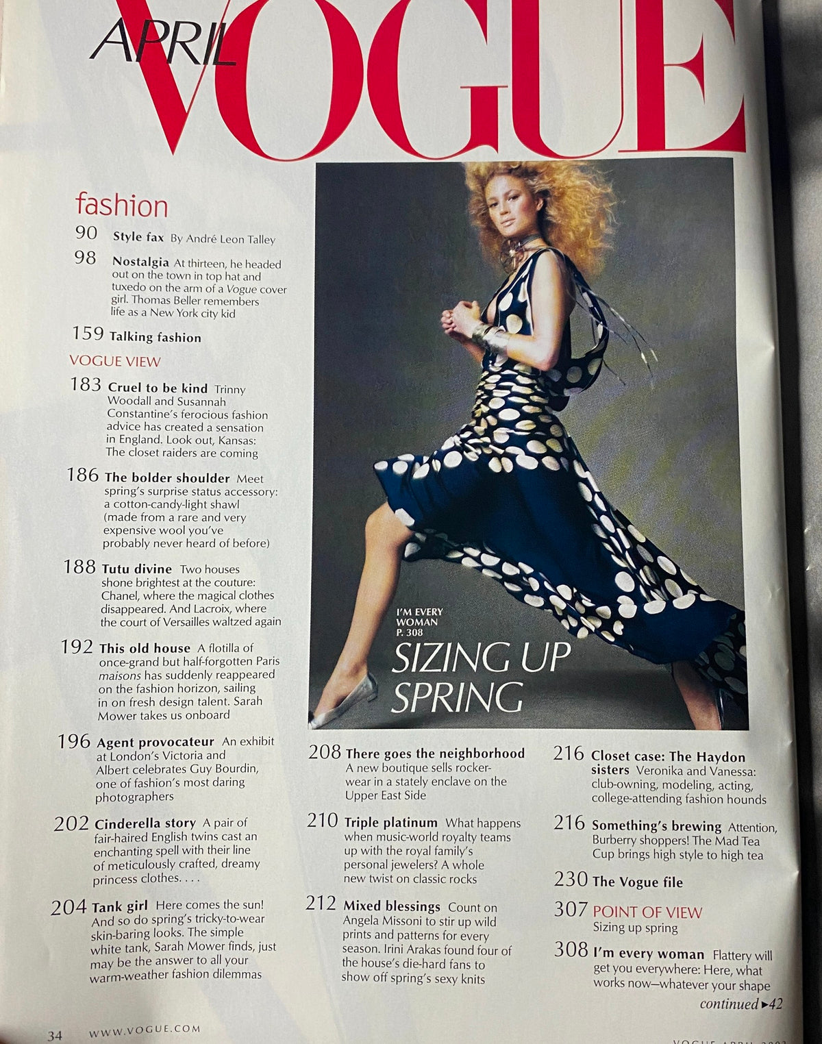 Inside page of Vogue Magazine April 2003, displaying fashion features including 'Sizing Up Spring' and various fashion articles reflective of early 2000s trends.