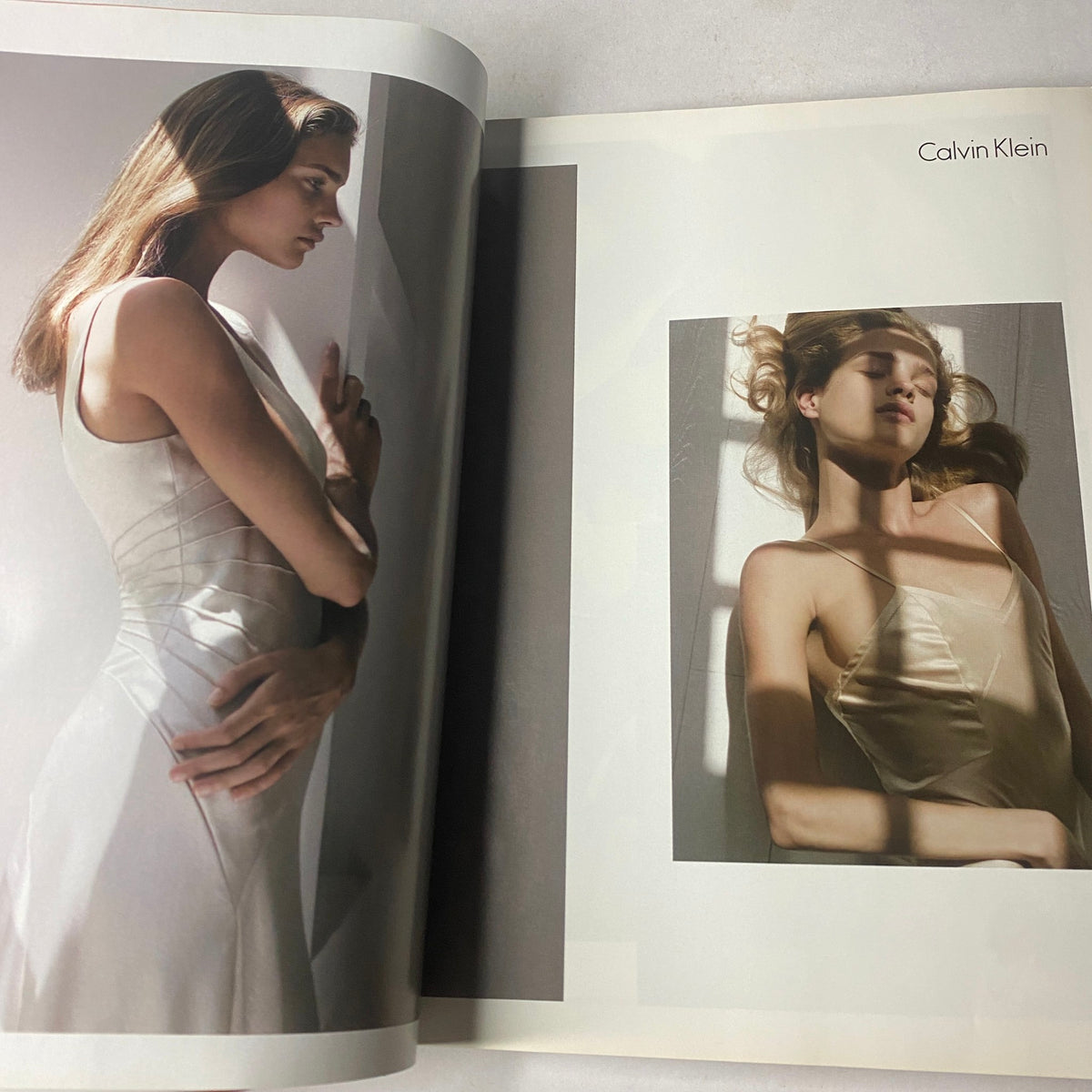 Vogue Magazine March 2003 Julianne Moore Cover No Label VG featuring a fashion spread with models showcasing Calvin Klein's elegant designs.