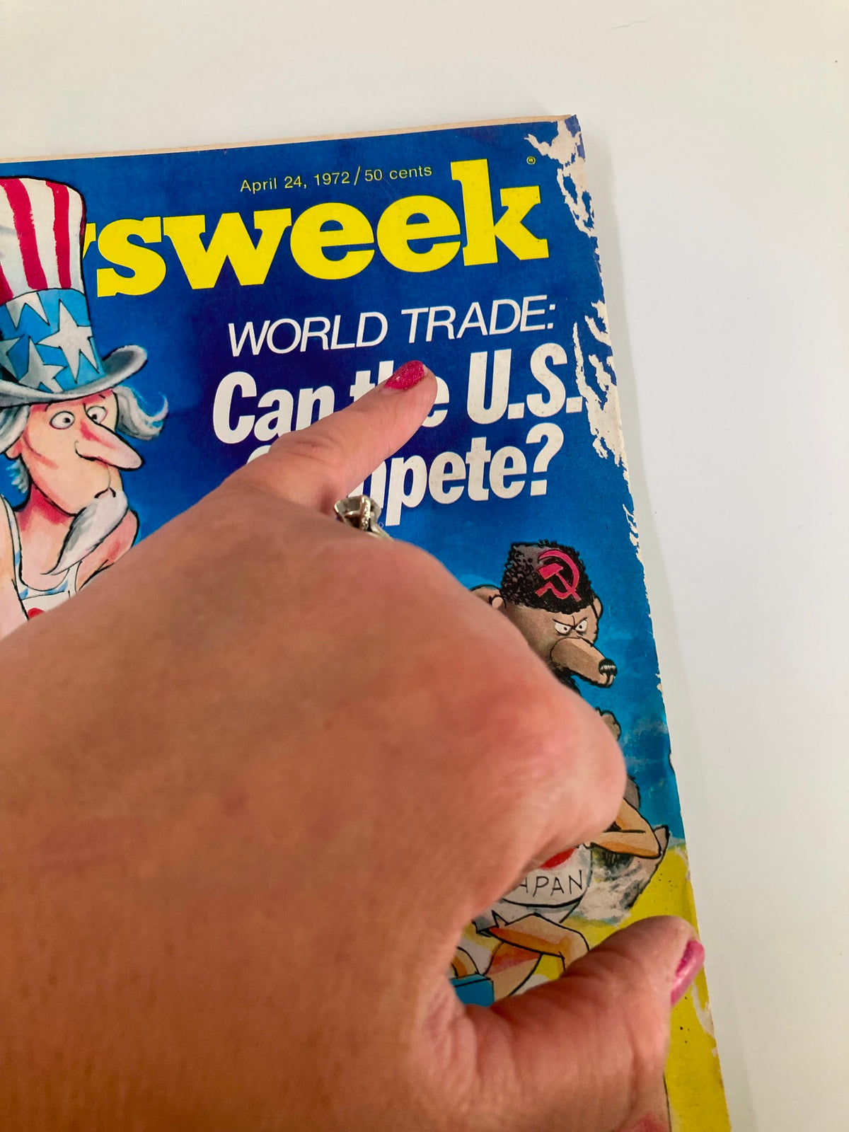 Close-up of the VTG Newsweek Magazine cover from April 24, 1972, highlighting the title 'WORLD TRADE: Can the U.S. Compete?' with a hand pointing at the text, showcasing its vintage appeal and historical context.