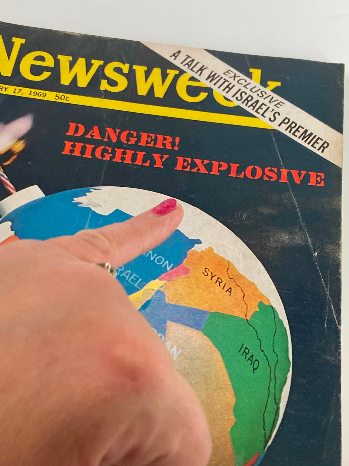 Close-up of VTG Newsweek Magazine February 17 1969 cover featuring the text 'Danger! Highly Explosive' and a finger pointing to the geographical area of Lebanon.