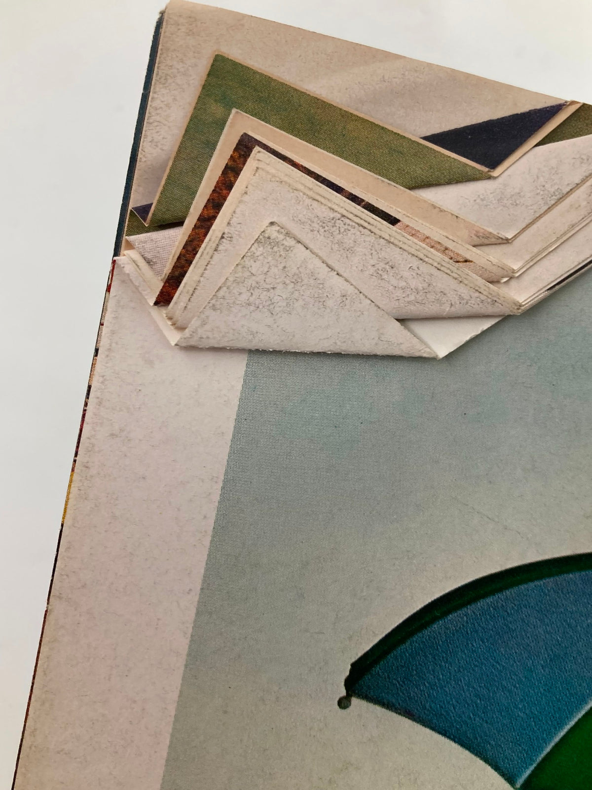 Close-up image of the vintage Sports Illustrated magazine pages showing minor wear, illustrating the magazine's age and preservation.