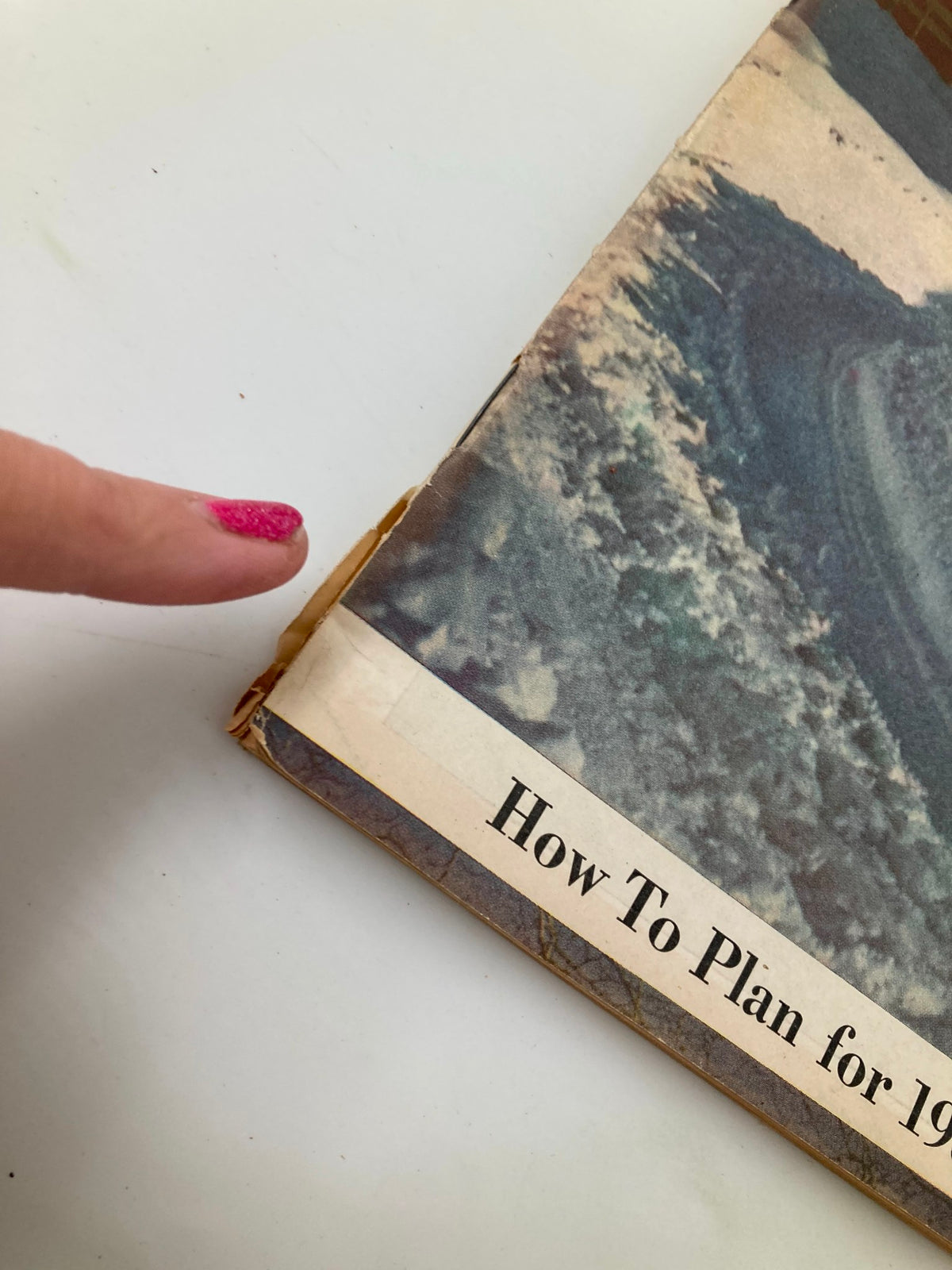 Close-up view of the January 1951 Farm Journal magazine showing the worn edge and the title 'How To Plan for 1951.'