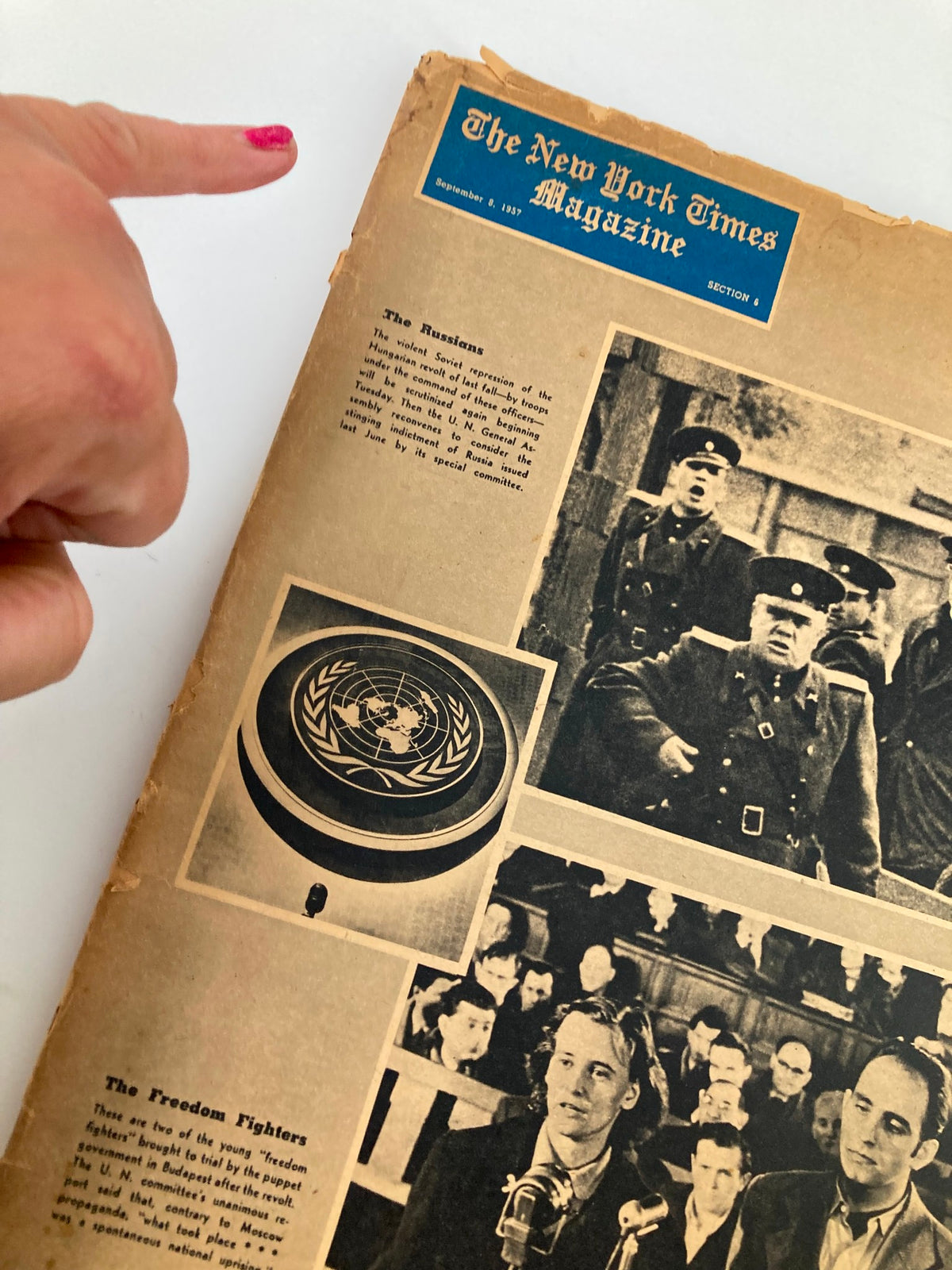 Close-up view of the cover of VTG The New York Times Magazine September 8 1957, with highlighted sections discussing 'The Russians' and 'The Freedom Fighters'.