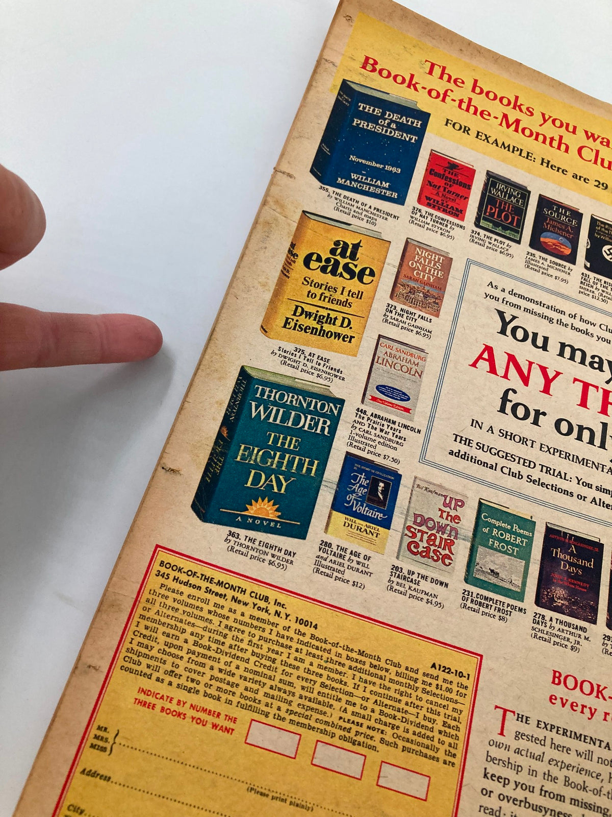 Back cover of The New York Times Magazine, October 22, 1967, showcasing a Book of the Month Club advertisement highlighting notable book titles.