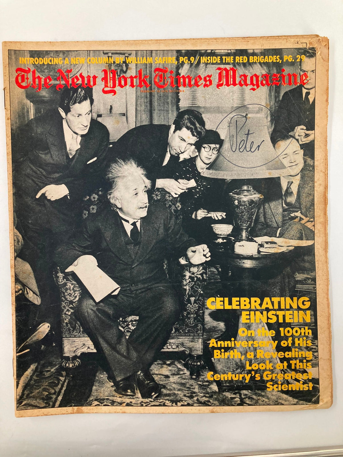 Cover of VTG The New York Times Magazine from February 18, 1979, featuring a celebration of Albert Einstein, with a group of people gathered around him in a historical black and white image.