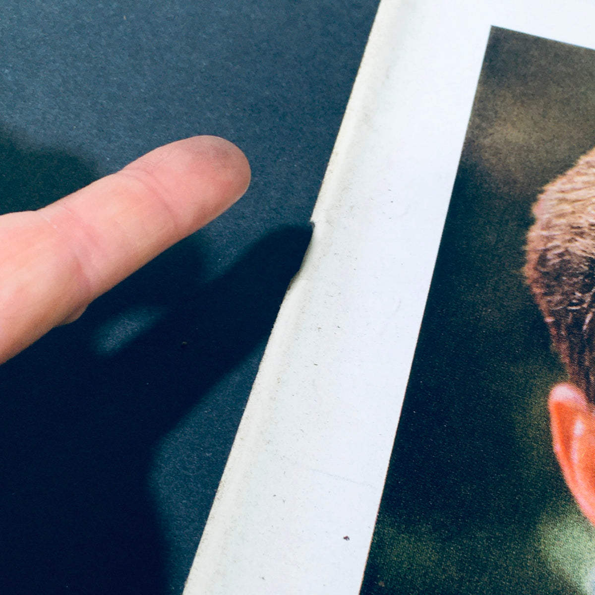Detail view of the edge of VTG Life Magazine July 16, 1965 highlighting the first portrait of John F. Kennedy by Arthur S.