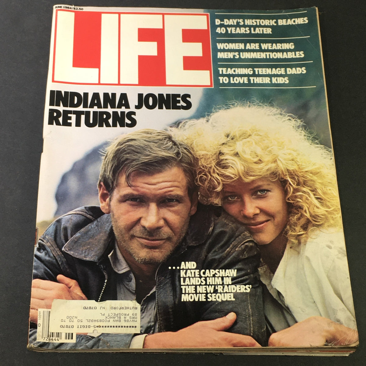 Vintage Life Magazine June 1984 cover featuring Indiana Jones with Harrison Ford and Kate Capshaw, highlighting their iconic roles and cinematic adventure.