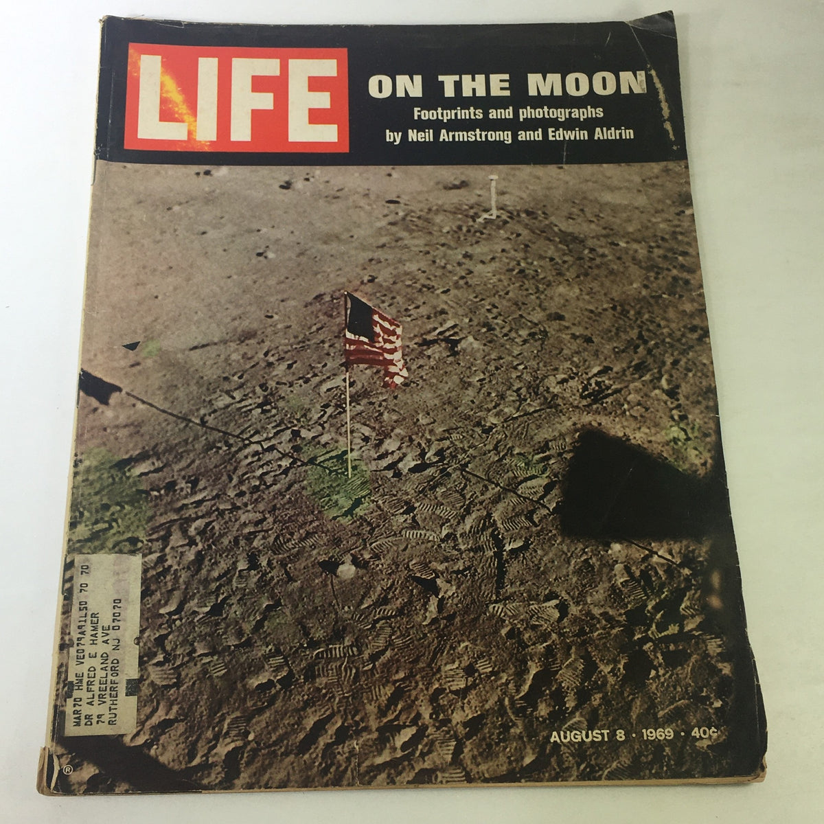 Cover of VTG Life Magazine August 8 1969, featuring the title 'Life on the Moon' with a photo of lunar footprints and an American flag.