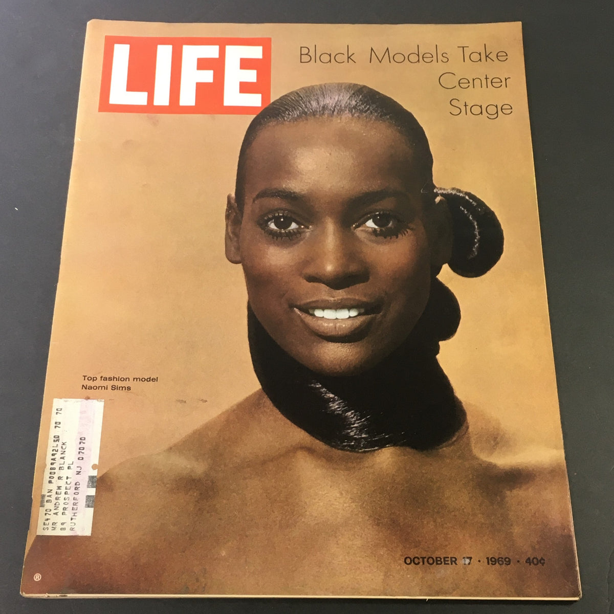 Vintage Life Magazine cover from October 17, 1969 featuring black model Naomi Sims taking center stage, highlighting diversity in fashion.