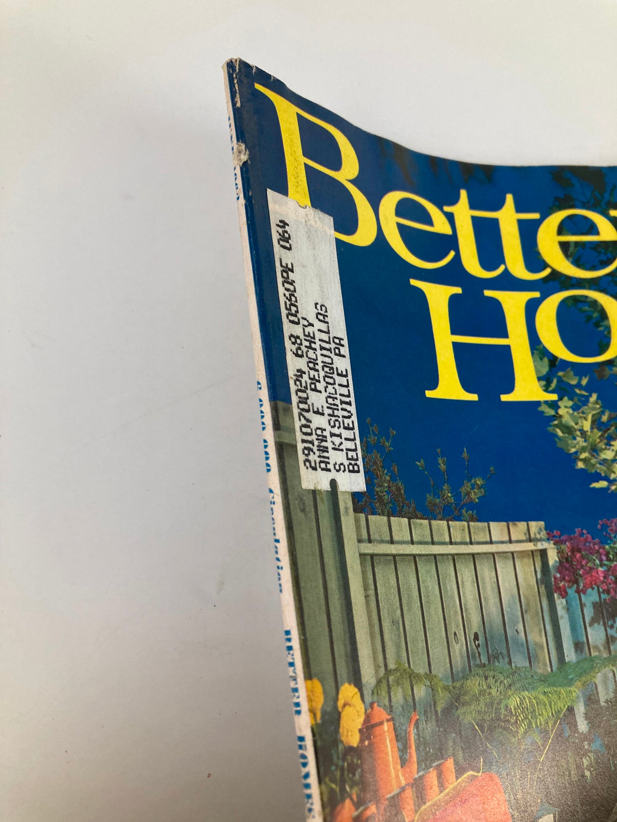 Side view of the VTG Better Homes and Gardens Magazine June 1963, showcasing the worn spine and label, adding charm to this vintage publication.
