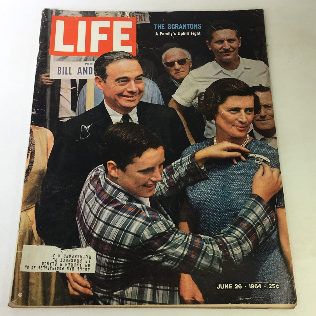 Cover of VTG Life Magazine from June 26, 1964 titled 'The Scrantons A Family's Uphill Fight', featuring a group of people including a young boy in a plaid suit, an adult man in a suit, and a woman in a blue dress with pearls.