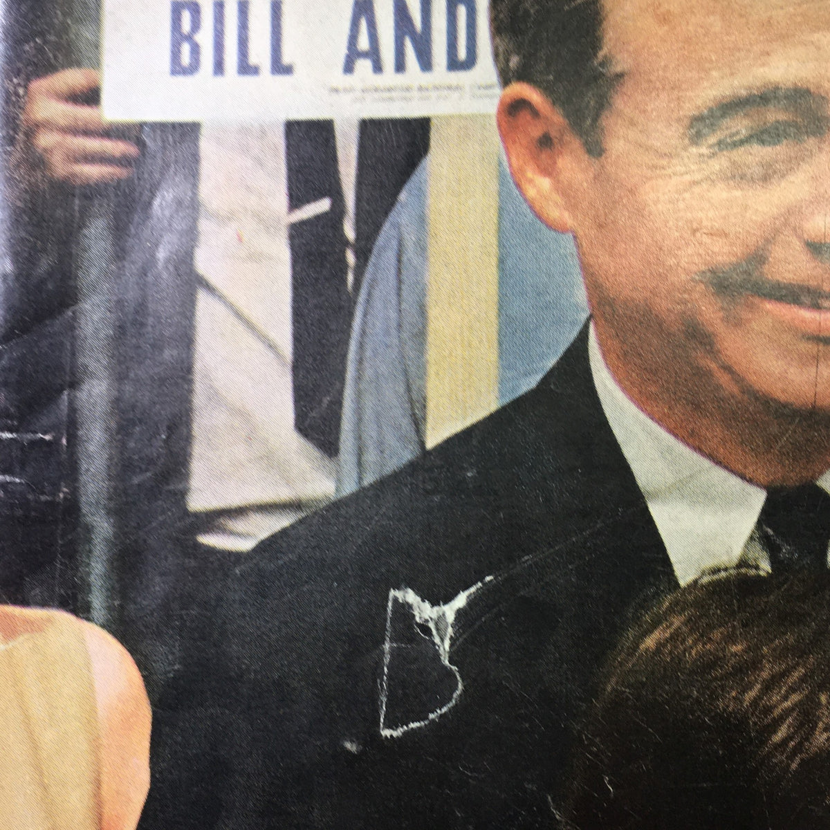 Close-up of the cover of VTG Life Magazine June 26, 1964, showing a partial view of the title 'The Scrantons A Family's Uphill Fight' with a man in a suit and a woman's face with a chipped cover.
