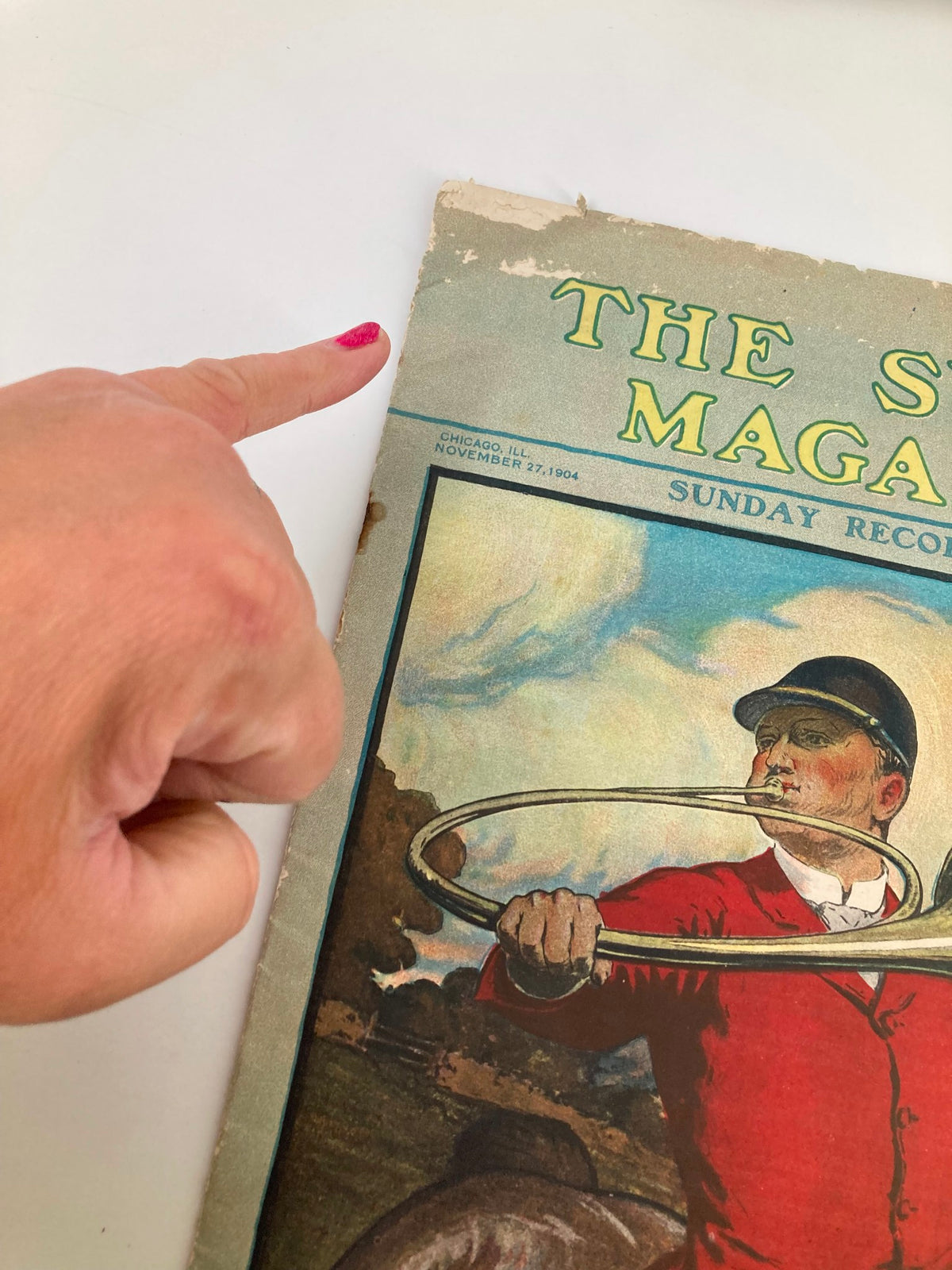 Close-up of the edge of the cover of VTG The Sunday Magazine November 27, 1904, highlighting the date and minor wear.