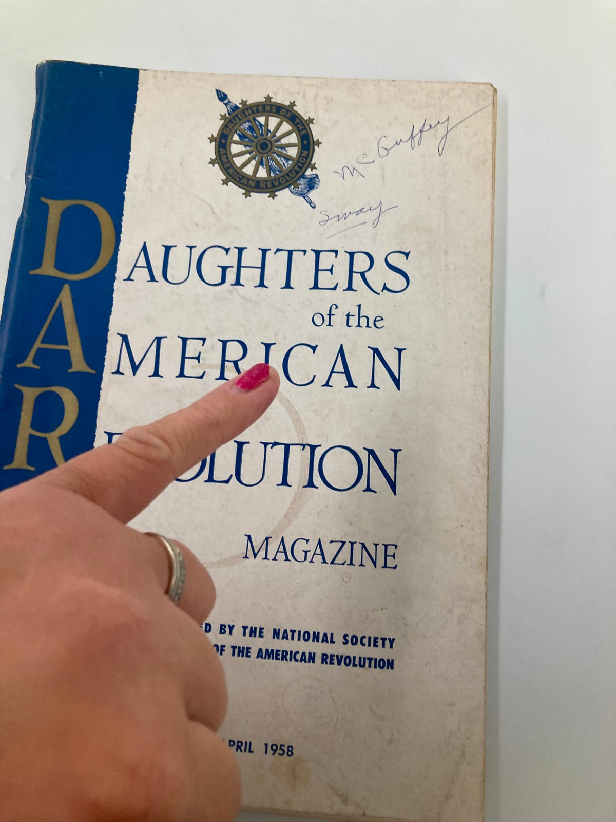 Close-up of the Daughters of the American Revolution Magazine, April 1958, titled 'Judgement from the Sky,' highlighting handwritten notes and a pointed finger indicating the title.