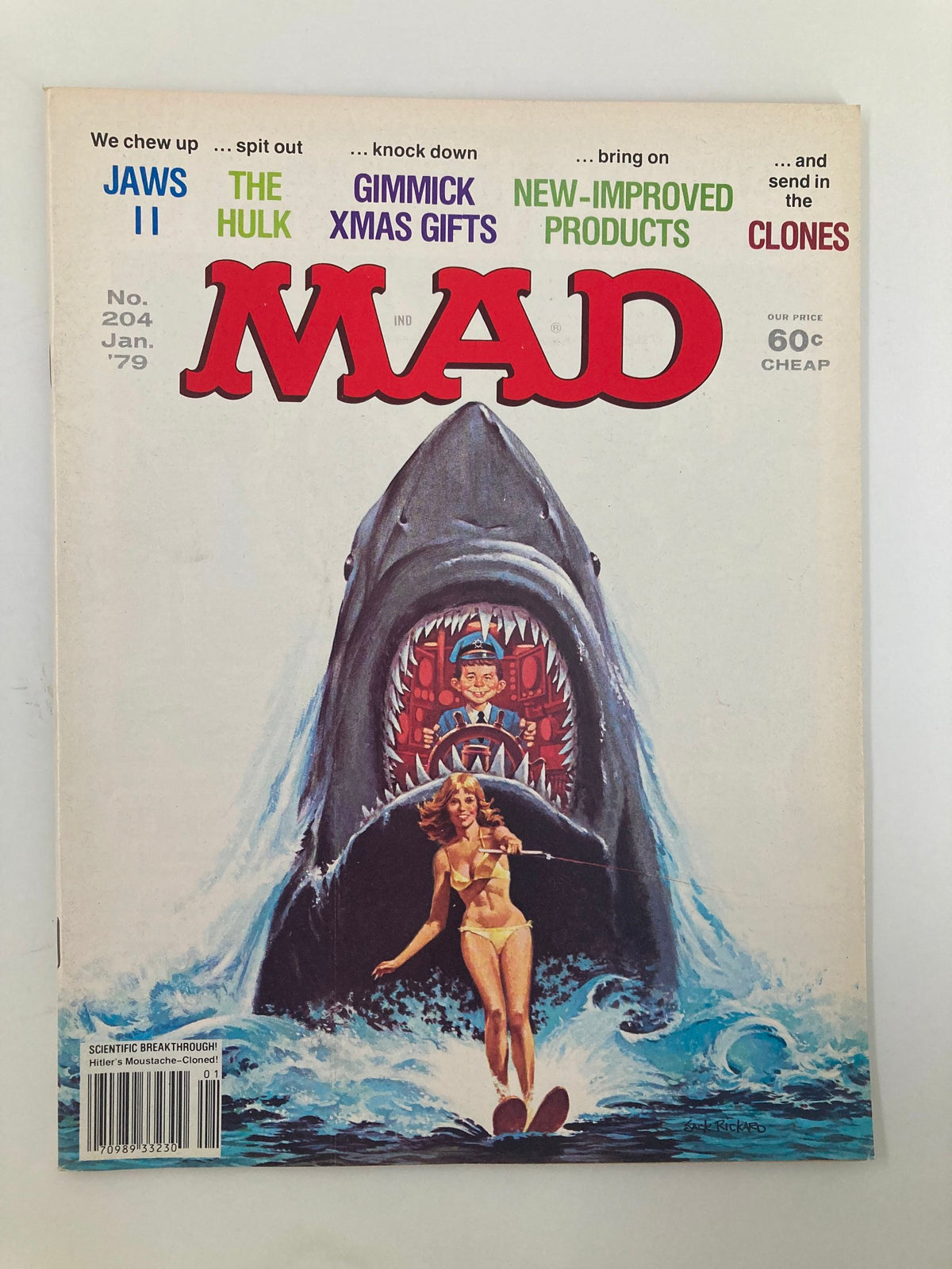 Cover of Mad Magazine January 1979 No. 204 featuring Alfred E. Neuman parodying 'Jaws II' with a shark and a woman water skiing, showcasing vibrant artwork and humorous elements typical of the series.