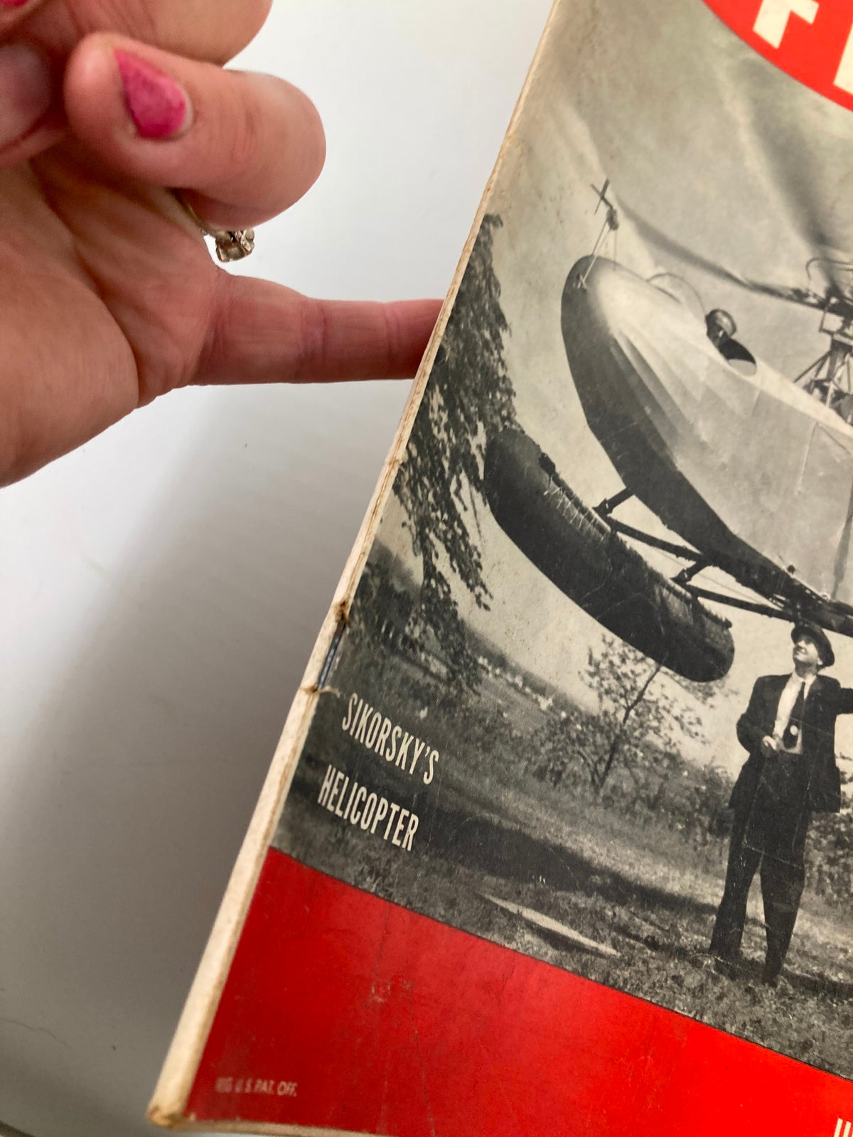 Side view of VTG Life Magazine June 21, 1943 showing Sikorsky's Helicopter title with a hand gesture pointing.