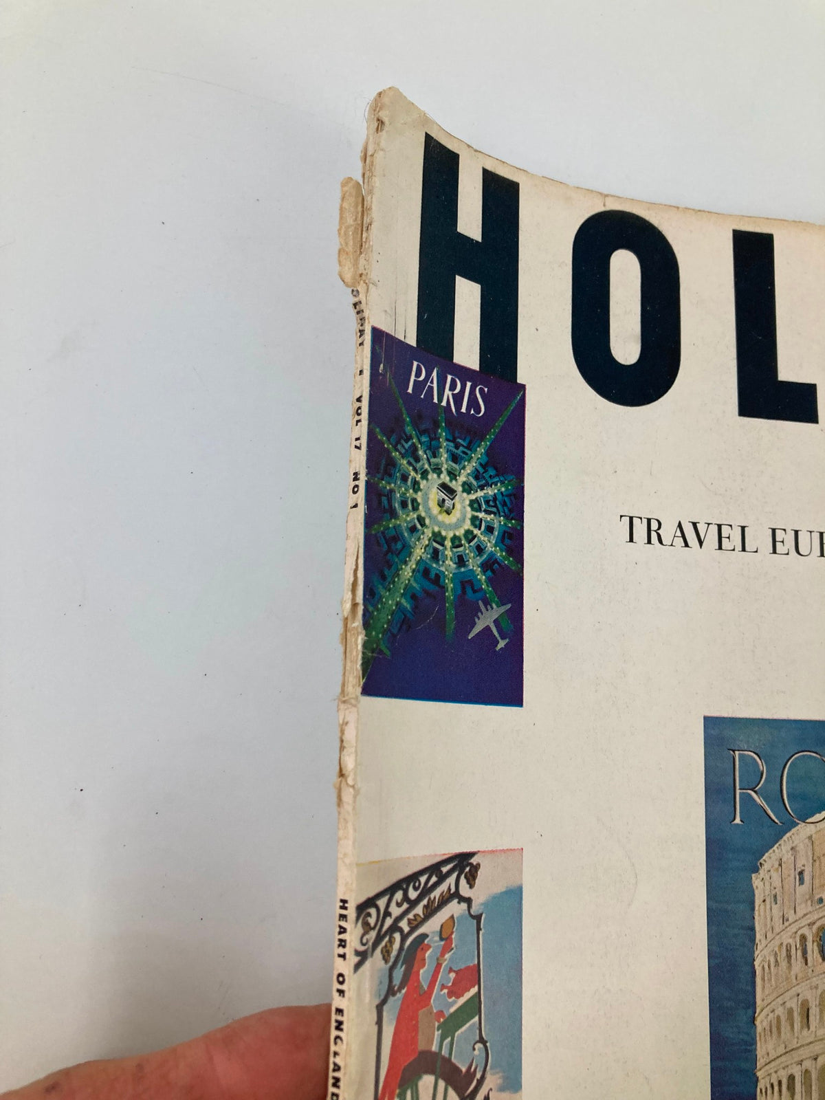 Cover detail of VTG Holiday Magazine January 1955 showcasing travel art with Paris theme.