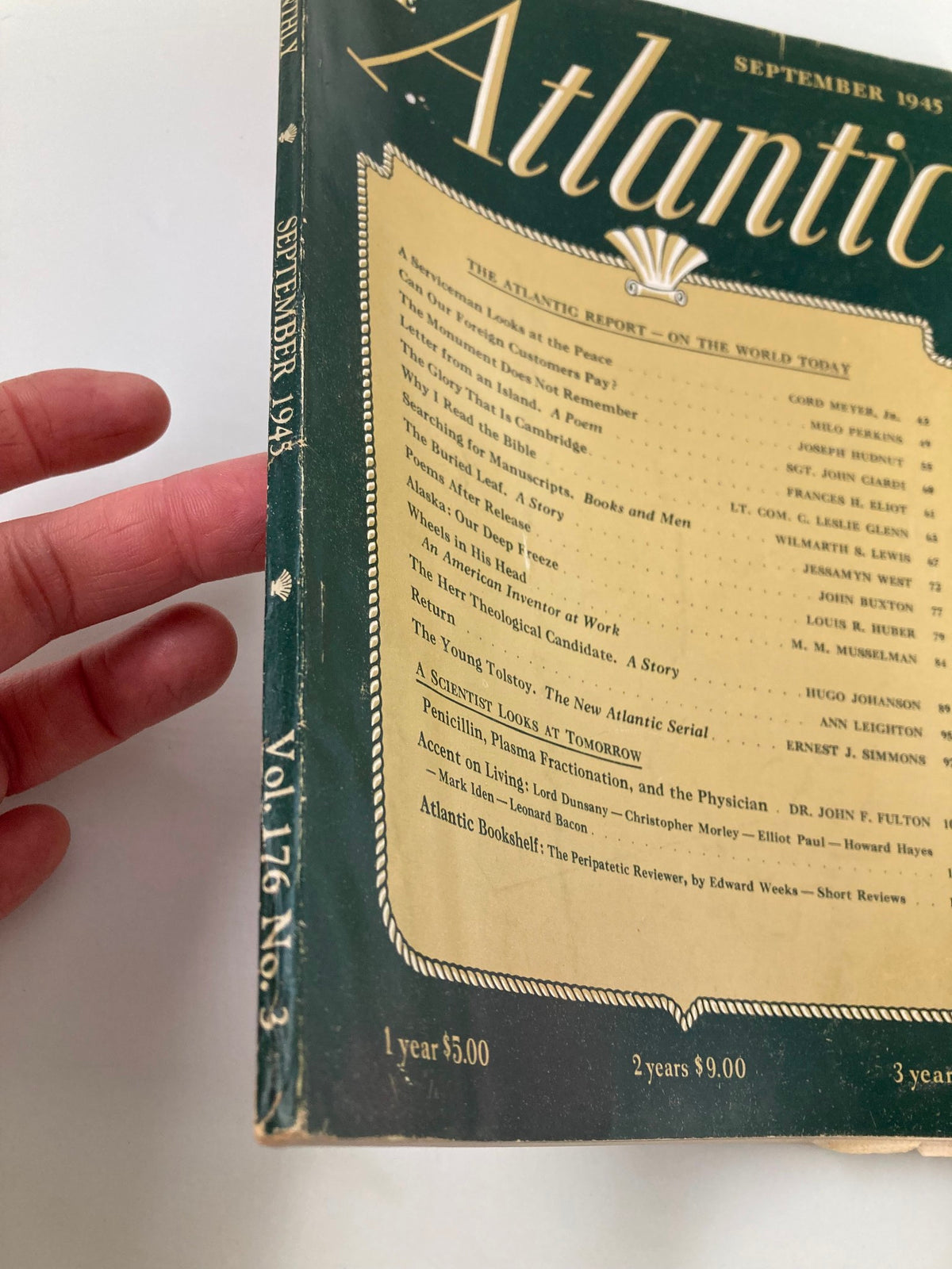 Side view of VTG The Atlantic Magazine September 1945, displaying the spine and contents listing, emphasizing the historical significance of the publication.