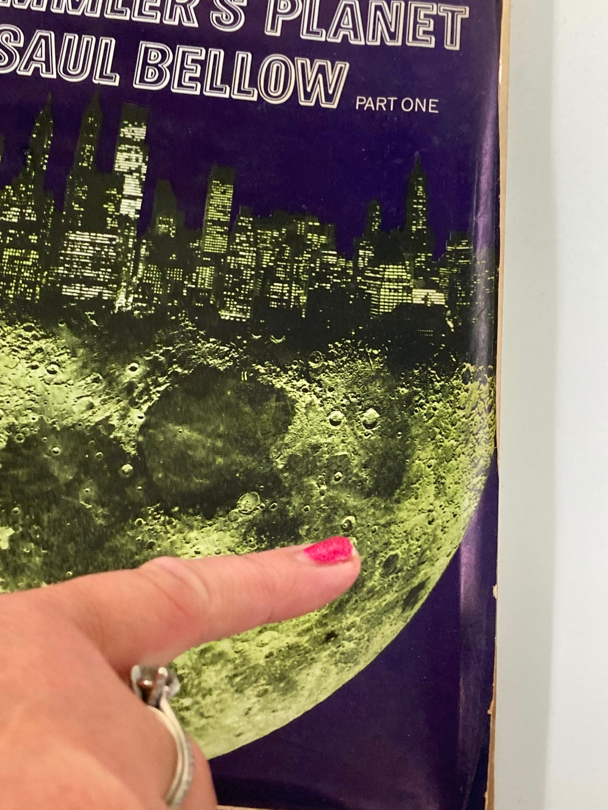 Close-up of the cover of VTG The Atlantic Magazine November 1969 showcasing 'Mr. Sammler's Planet' with a finger pointing at details of the lunar surface.