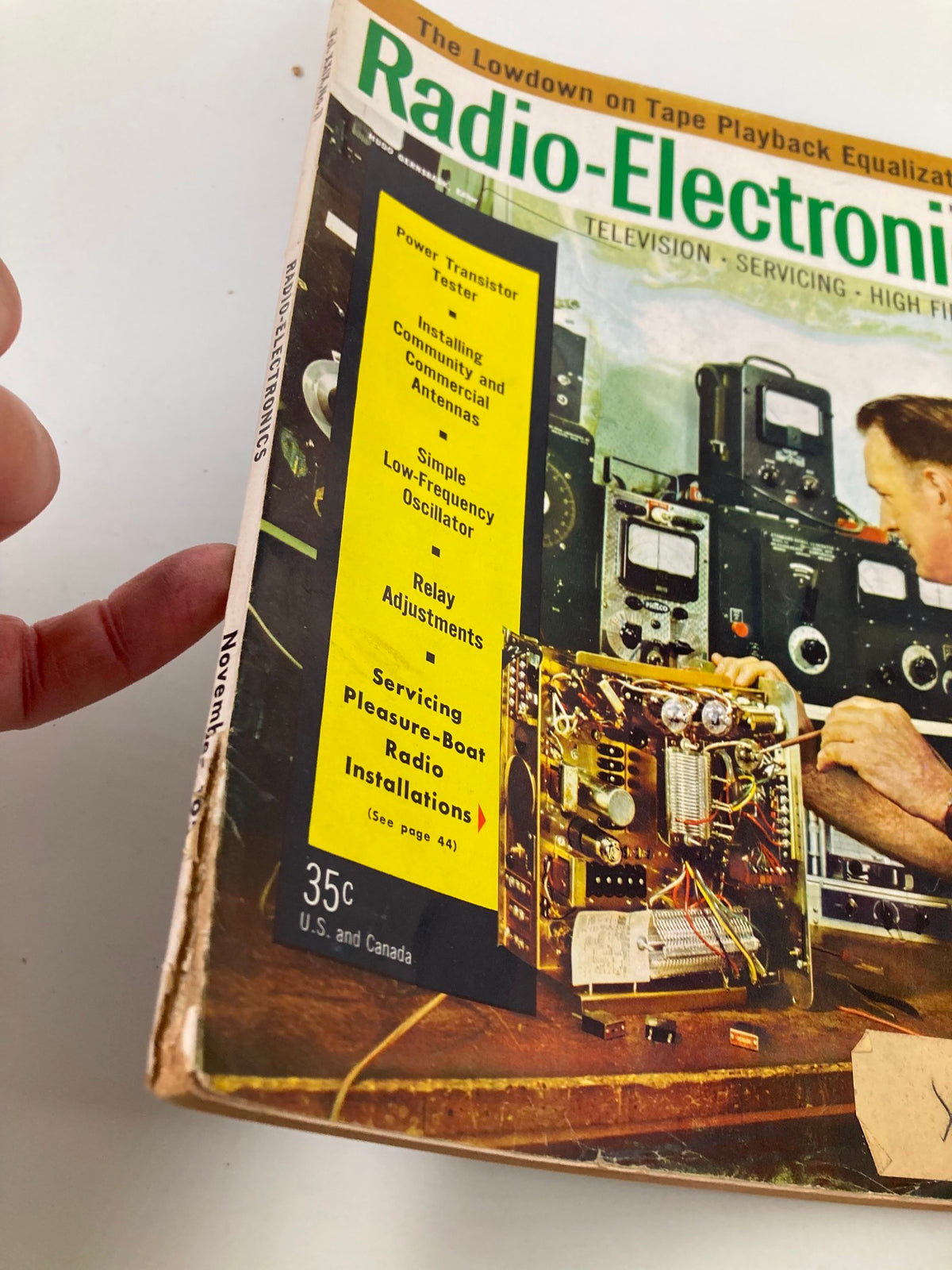 Close-up of VTG Radio-Electronics Magazine November 1958 cover, showcasing articles related to radio technology and repairs.