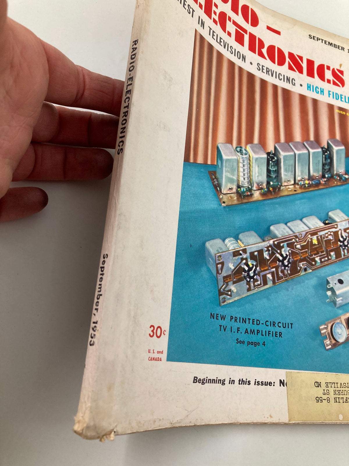 Side view of the VTG Radio-Electronics Magazine September 1953 displaying its spine and cover, featuring details about early television technology and Printed-Circuit TV I.F. Amplifier.