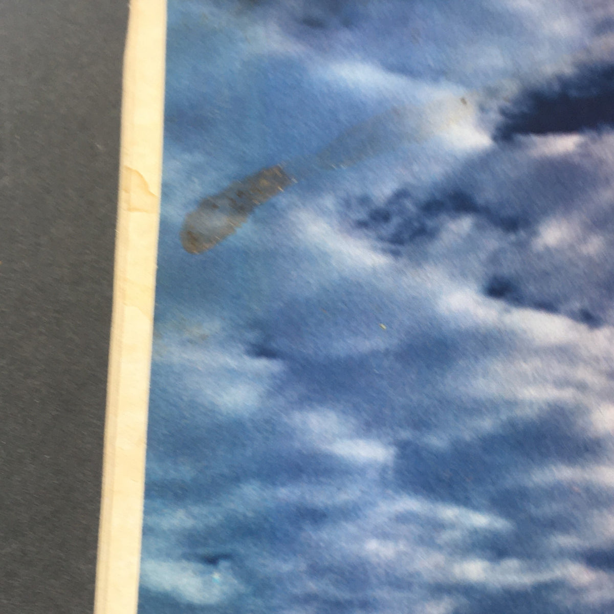 Image of a stained page from the January 1983 Life Magazine, showing weathered edges and a cloudy background.