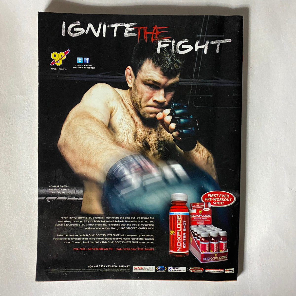 UFC Magazine June/July 2010 No. 5 showcasing Quinton 'Rampage' Jackson's dynamic presence, featuring an advertisement with a fighter training intensely, emphasizing the theme 'Ignite the Fight'.