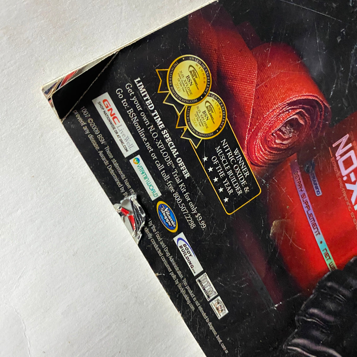 Back cover of UFC Magazine Summer 2009 No. 1 Premier Issue featuring promotional offers and product advertisements related to mixed martial arts.