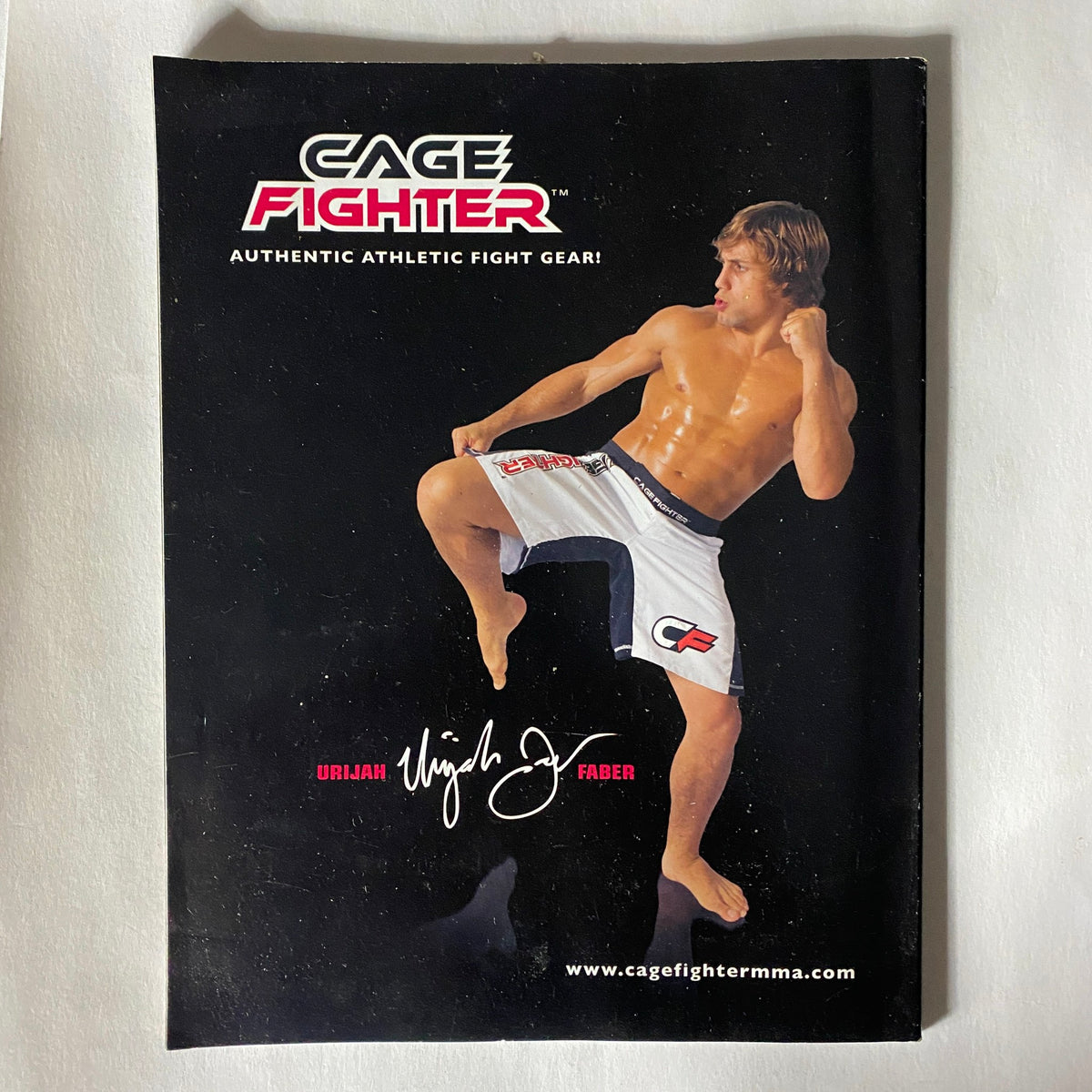 Promotional brochure for Cage Fighter featuring Urijah Faber in a dynamic pose, emphasizing authentic athletic fight gear for MMA enthusiasts.