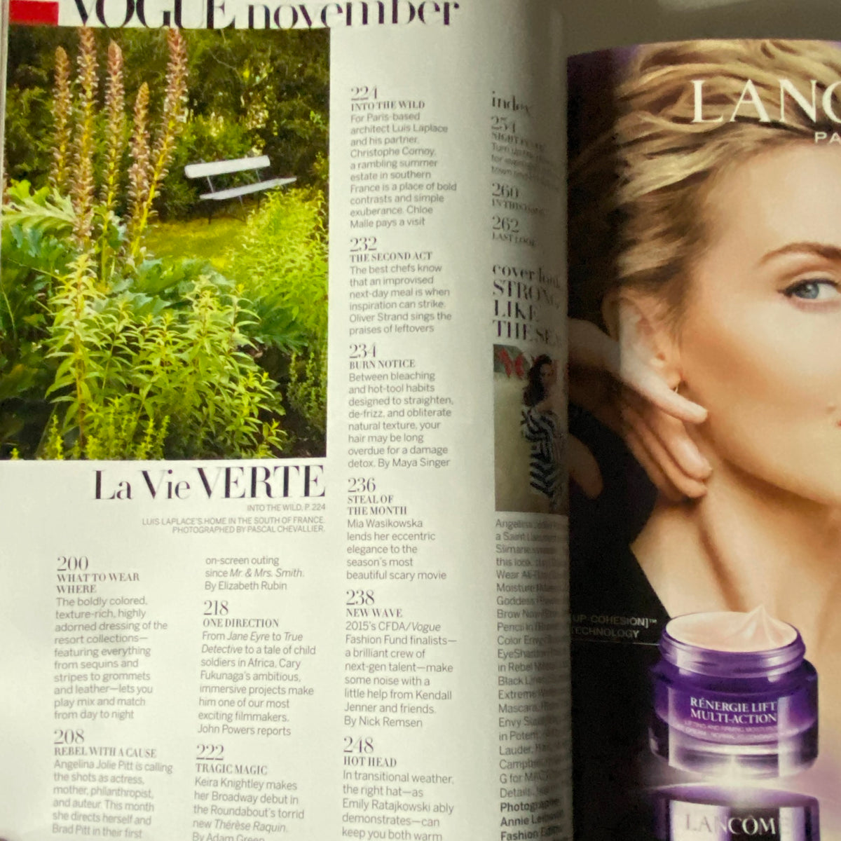 Interior page of Vogue US Magazine November 2015, highlighting articles and content relevant to fashion and lifestyle, alongside an advertisement for Lancome.
