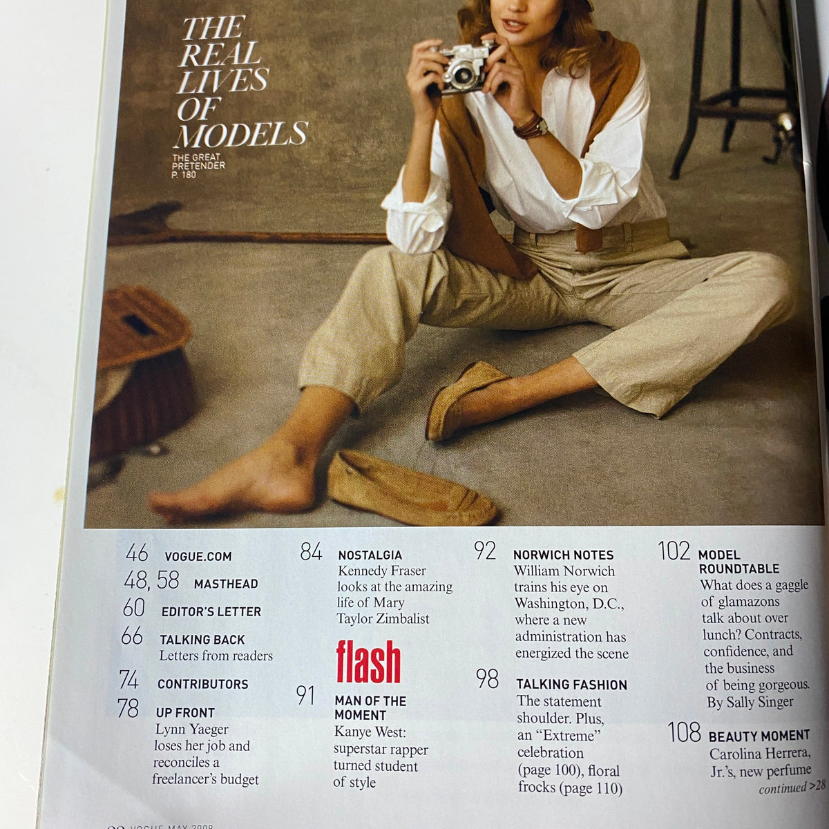 Inside Vogue Magazine May 2009 featuring articles, including The Real Lives of Models, Editor's Letter, and Contributions. Cover showcase with Liya Kebede, Isabeli Fontana, and Jourdan Dunn.