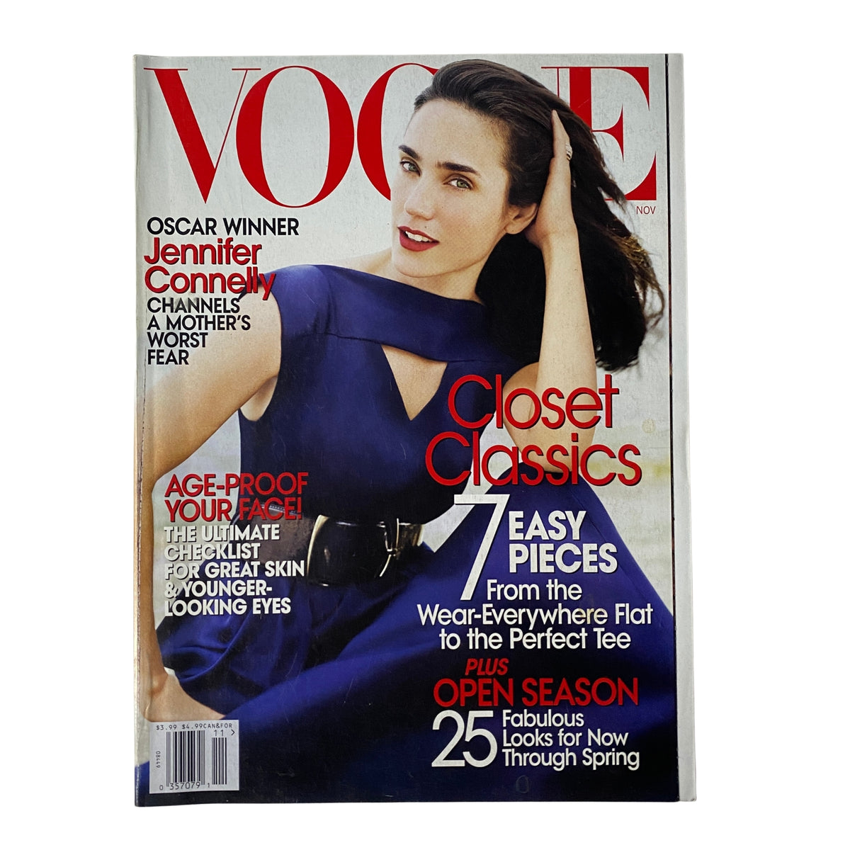 Vogue Magazine November 2007 featuring Jennifer Connelly on the cover wearing a stylish blue dress, highlighting her role as an Oscar-winning actress.