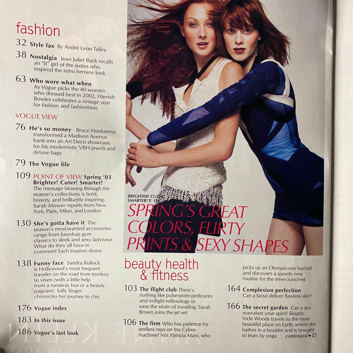 Table of contents from Vogue Magazine January 2003, featuring highlights such as fashion trends and health articles, alongside the 'Sandra Bullock Takes Manhattan' cover story.
