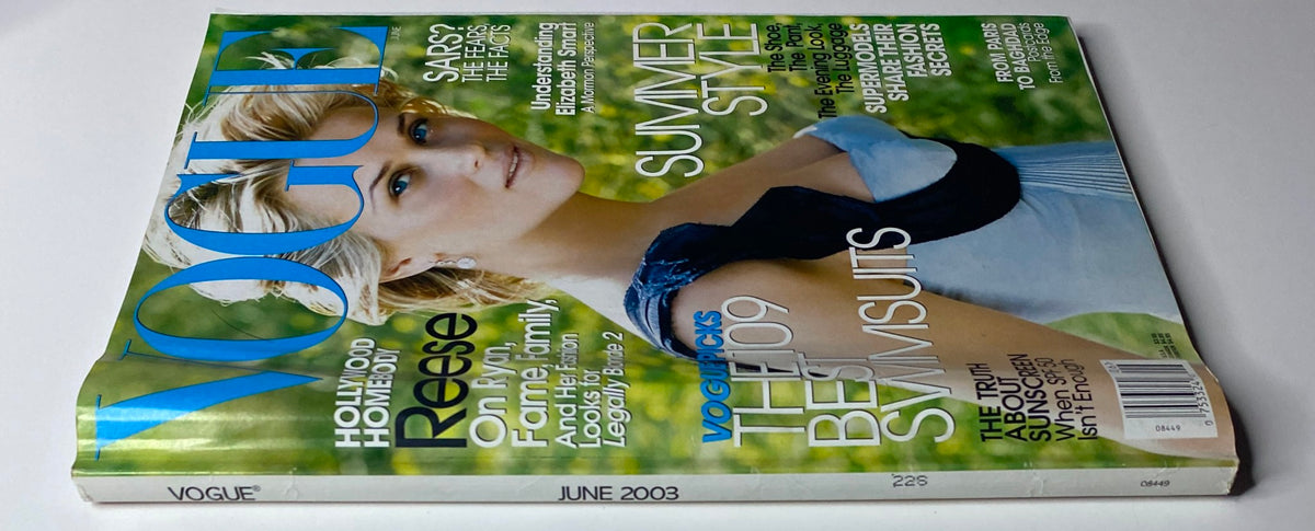 Vogue Magazine June 2003, featuring Reese Witherspoon on the cover, highlighting summer fashion trends and swimsuit selections.