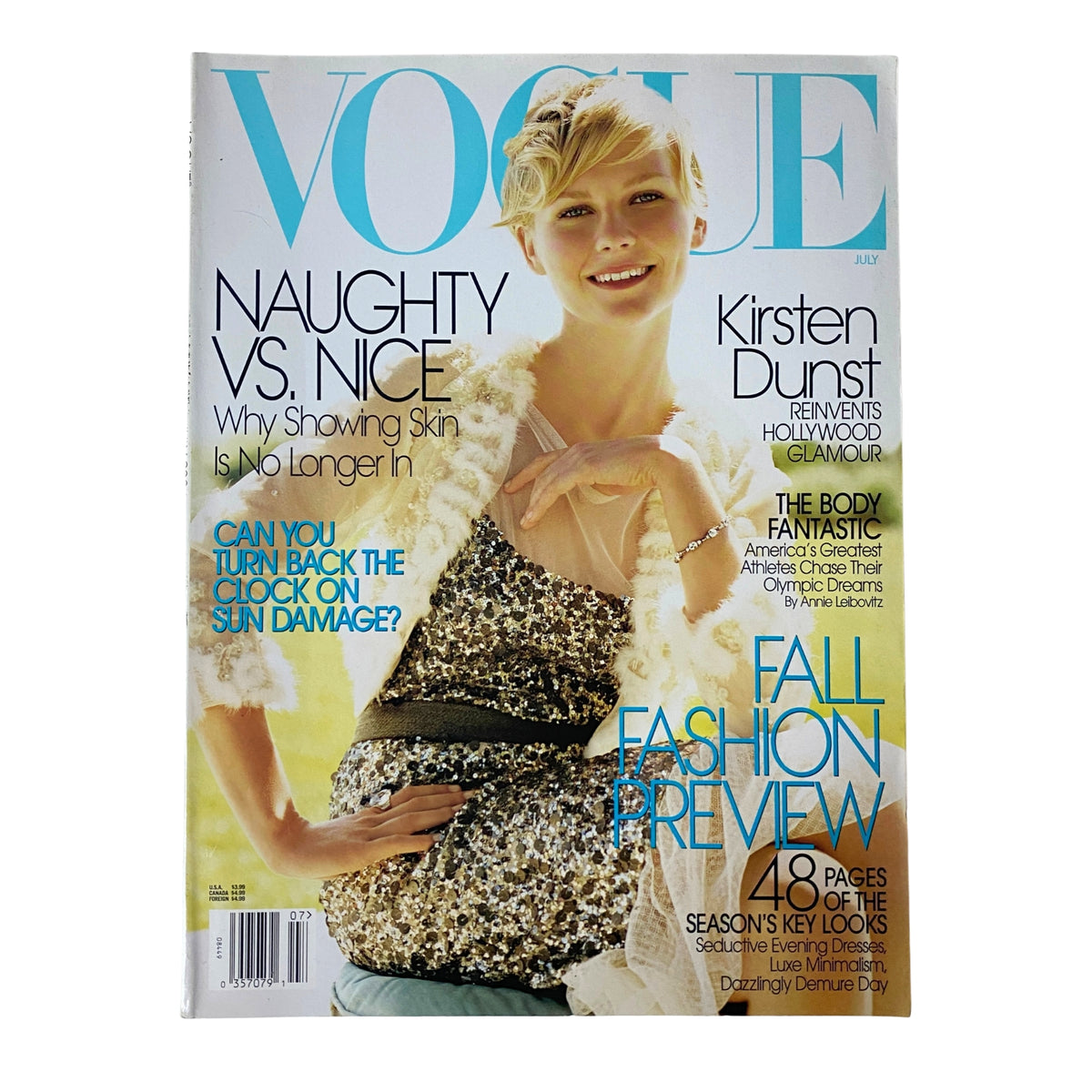 Vogue Magazine July 2004 featuring Kirsten Dunst on the cover, showcasing her Hollywood glamour and style. The cover includes headlines about fashion trends and a preview of the fall fashion season.