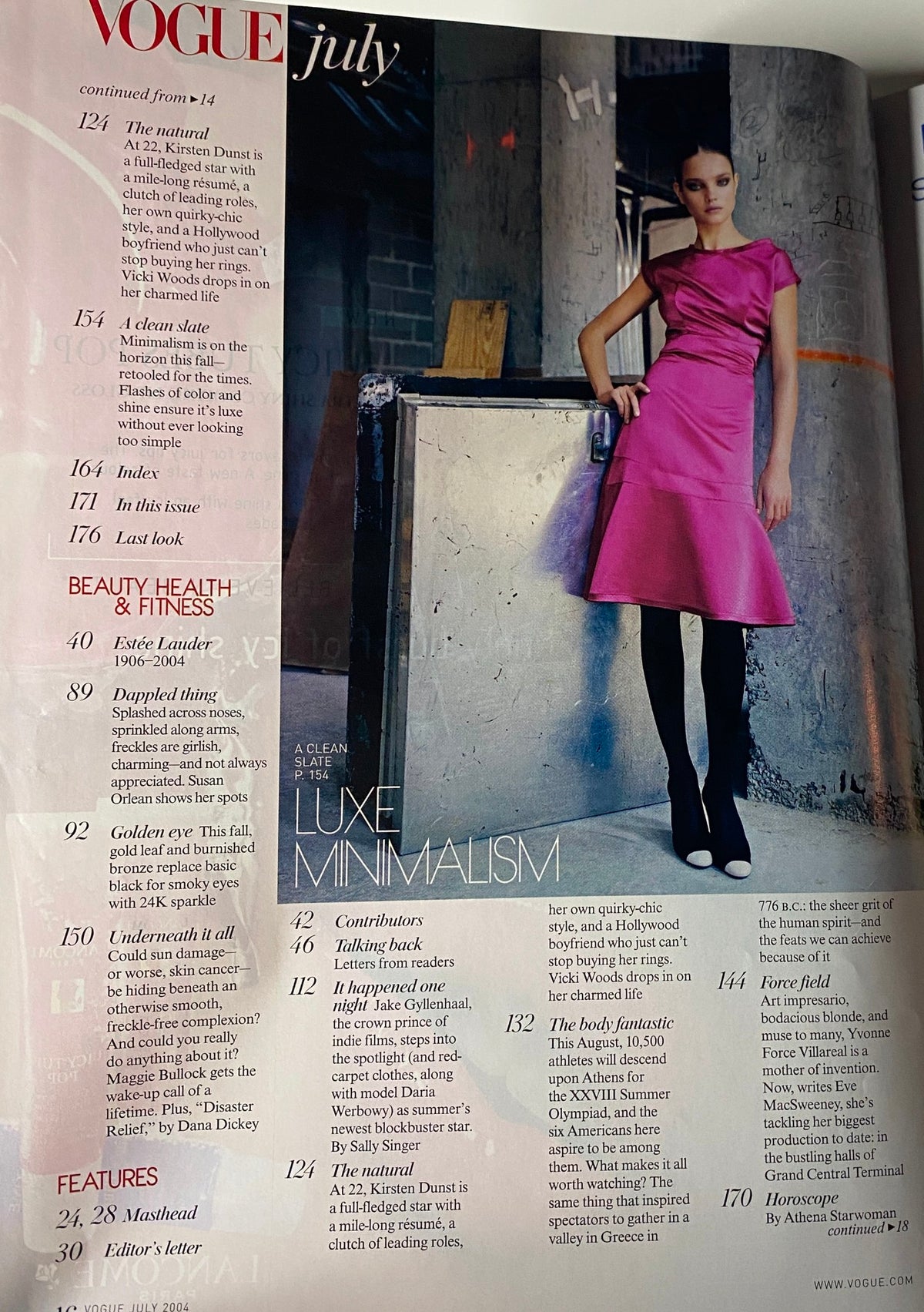 Interior page of Vogue Magazine July 2004 displaying a striking fashion editorial featuring a model in a pink dress, focused on luxe minimalism.