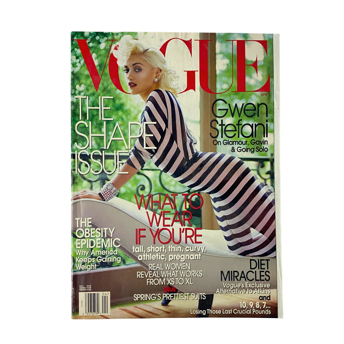 Vogue Magazine April 2004 cover featuring Gwen Stefani in a stylish striped gown, showcasing bold fashion trends and the theme 'The Shape Issue.' Highlights include discussions on diet miracles and body positivity.