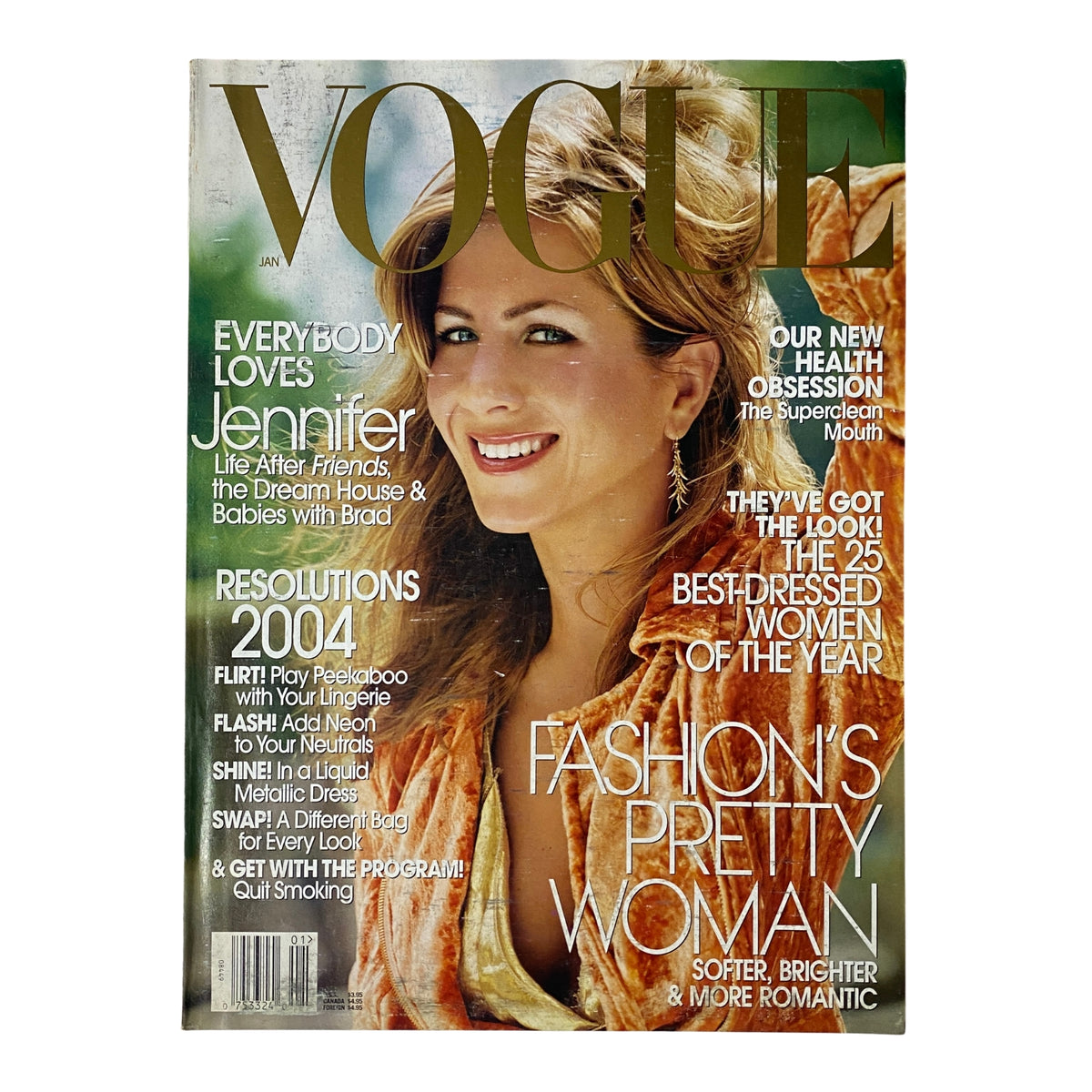 Vogue Magazine January 2004 cover featuring Jennifer Aniston, showcasing her elegant look in Louis Vuitton and announcing features on fashion and resolutions for the new year.