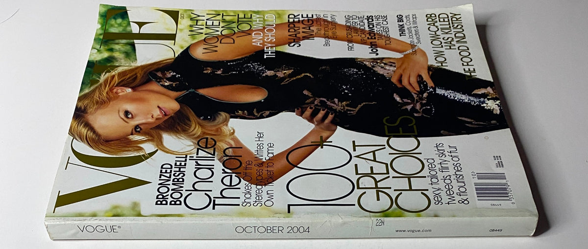 Side view of Vogue Magazine October 2004 showcasing actress Charlize Theron on the cover, emphasizing her significance in Hollywood fashion.