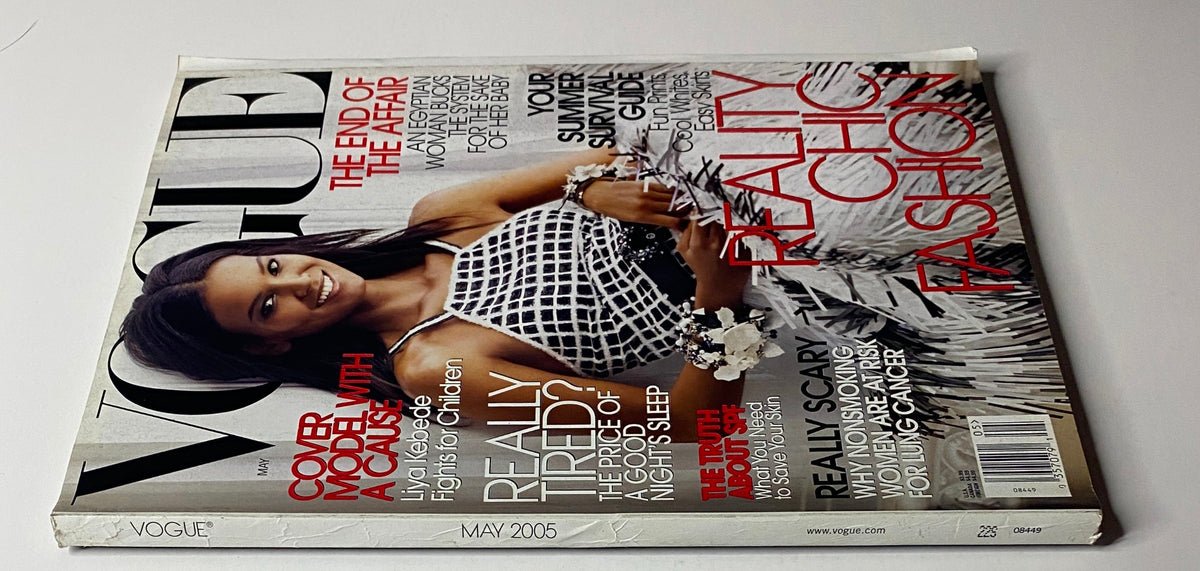 Vogue Magazine May 2005 cover featuring Liya Kebede in Chanel Haute Couture, showcasing a sequined halter top and fringe skirt, emphasizing elegance and fashion influence.