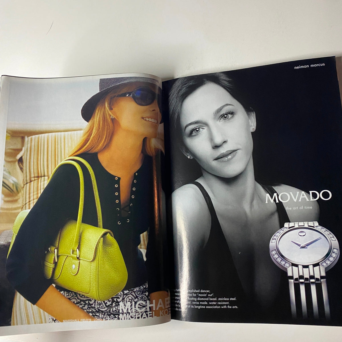 Interior page of Vogue Magazine May 2005 featuring a fashion advertisement for Movado, highlighting luxury watch design, complemented by a stylish model wearing a bright green handbag.