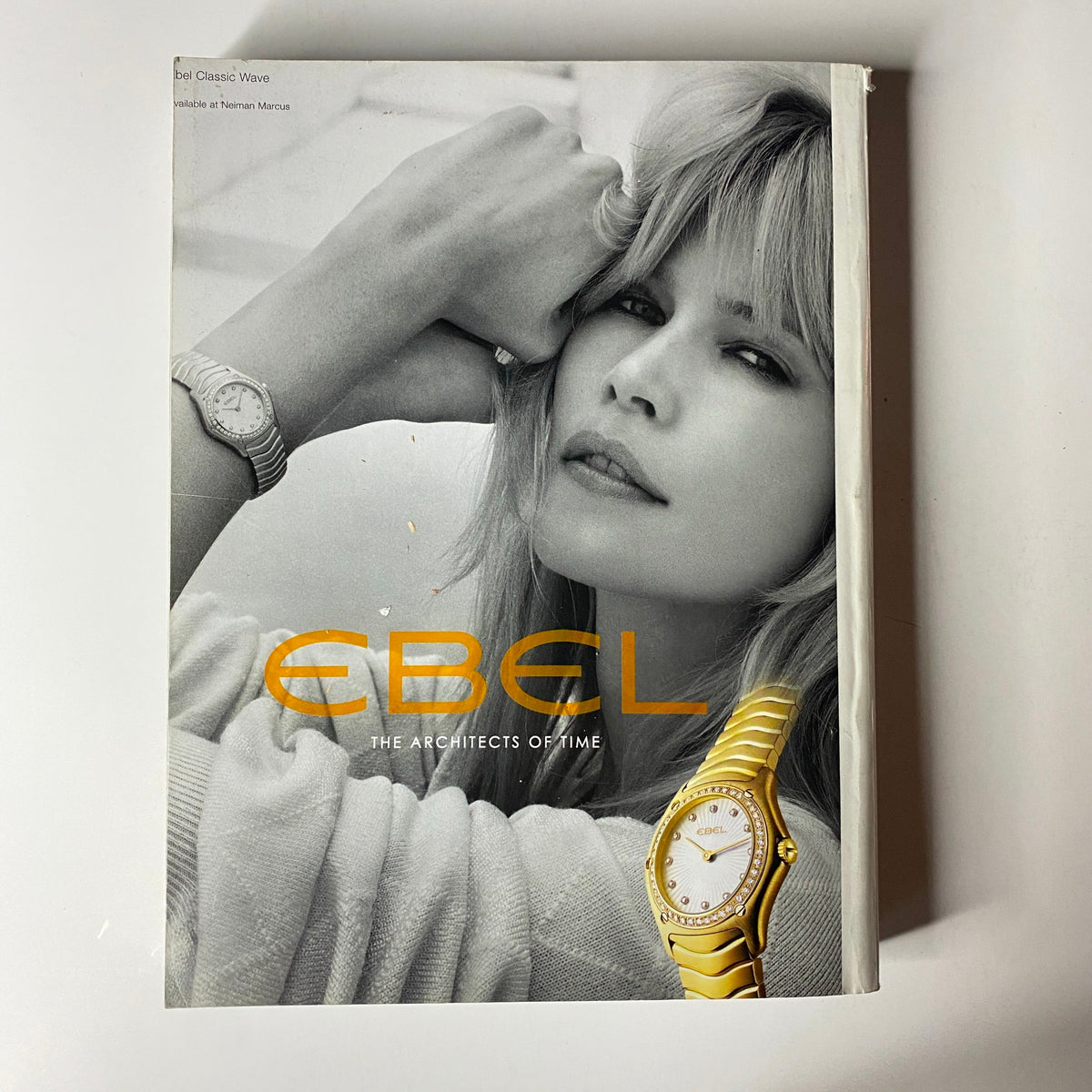 Ebel advertisement featured in Vogue Magazine September 2004, showcasing a model wearing a stylish watch, emphasizing the brand's tagline 'The Architects of Time'.