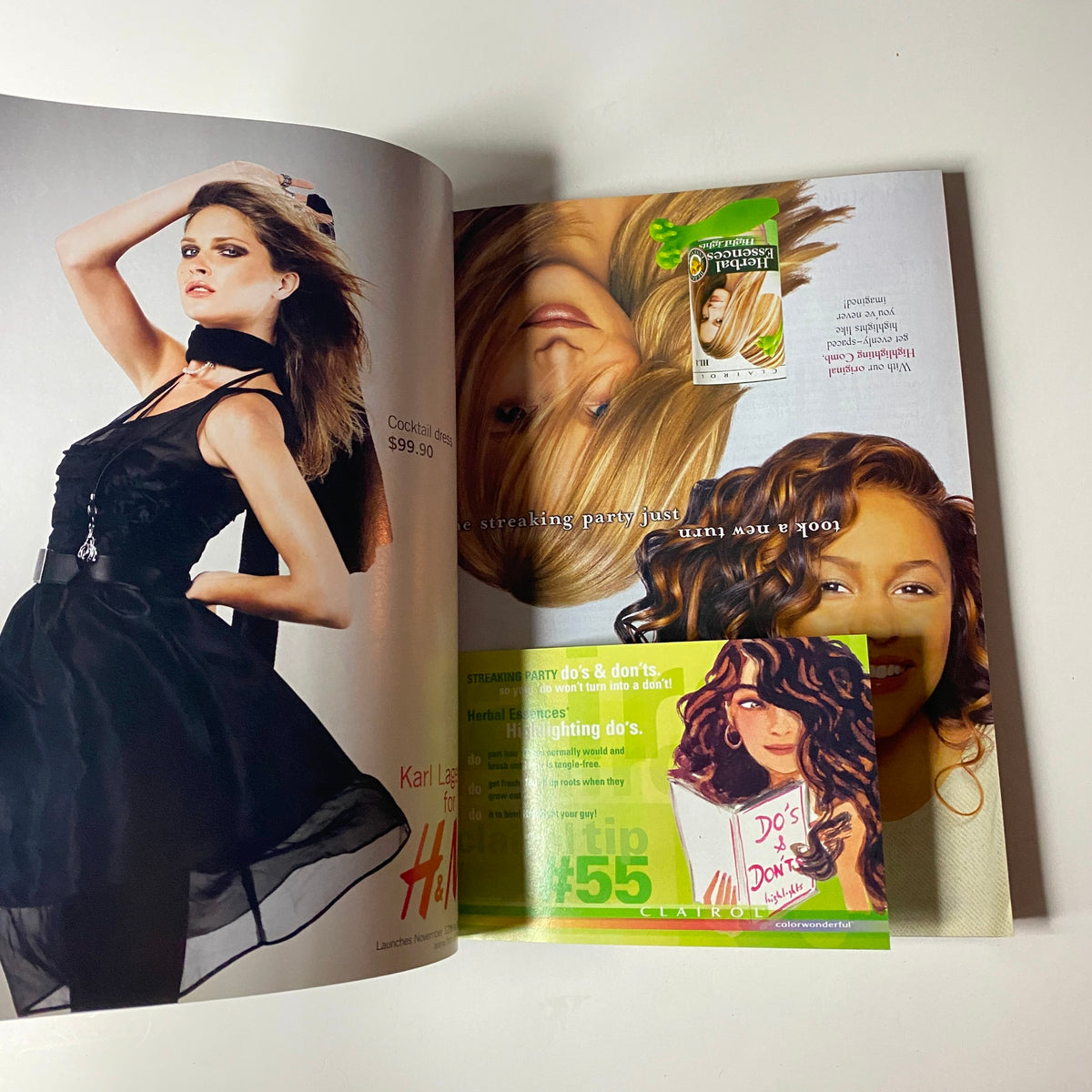 A spread from Vogue Magazine November 2004 showcasing stylish advertisements and a feature about party looks.