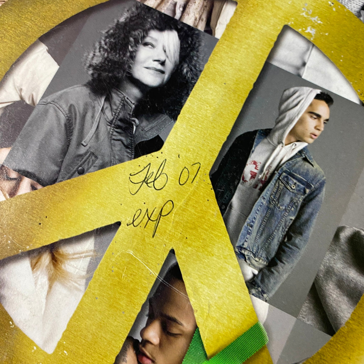 Close-up of the GAP Peace catalog from 2007, emphasizing a peace sign and showcasing a female model in casual wear. This image ties back to the themes of fashion and cultural awareness in the Vogue Magazine December 2006 issue.