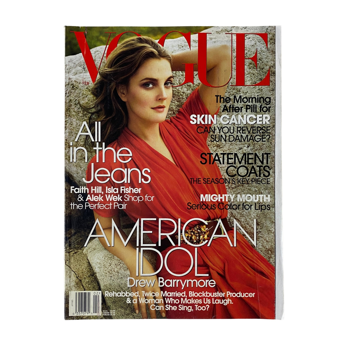 Cover of Vogue Magazine February 2006 featuring Drew Barrymore, with the title 'American Idol' highlighted. The issue includes features on fashion trends and cultural commentary, making it a collectible for mid-2000s fashion enthusiasts.