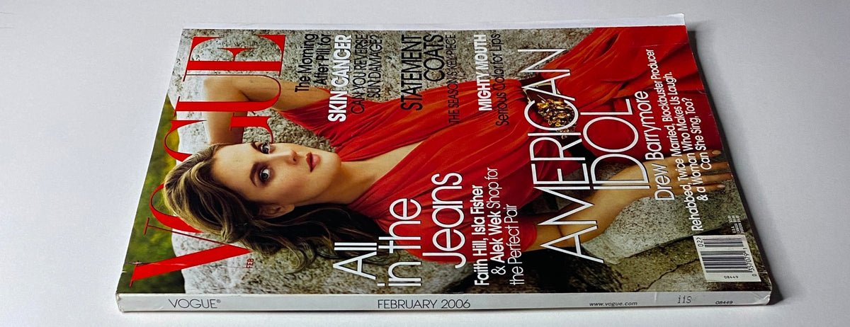 Vogue Magazine February 2006 featuring Drew Barrymore on the cover, showcasing a red dress and highlighting the theme 'American Idol.' The magazine reflects mid-2000s fashion and culture.