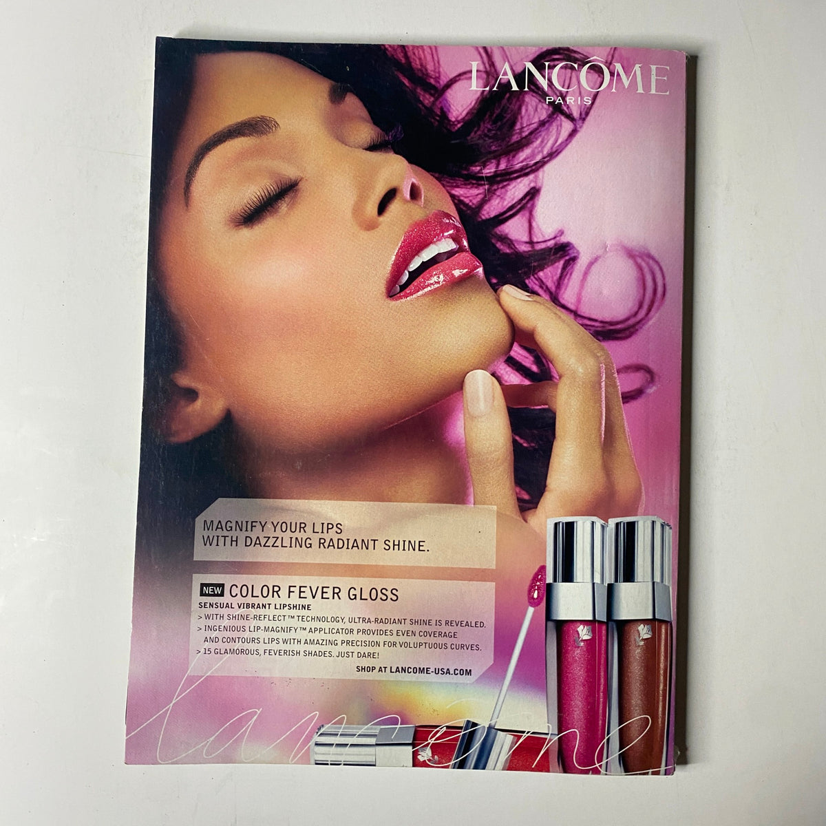 Vogue Magazine January 2007 featuring an advertisement for Lancôme, promoting Color Fever Gloss lipstick with vibrant shades.