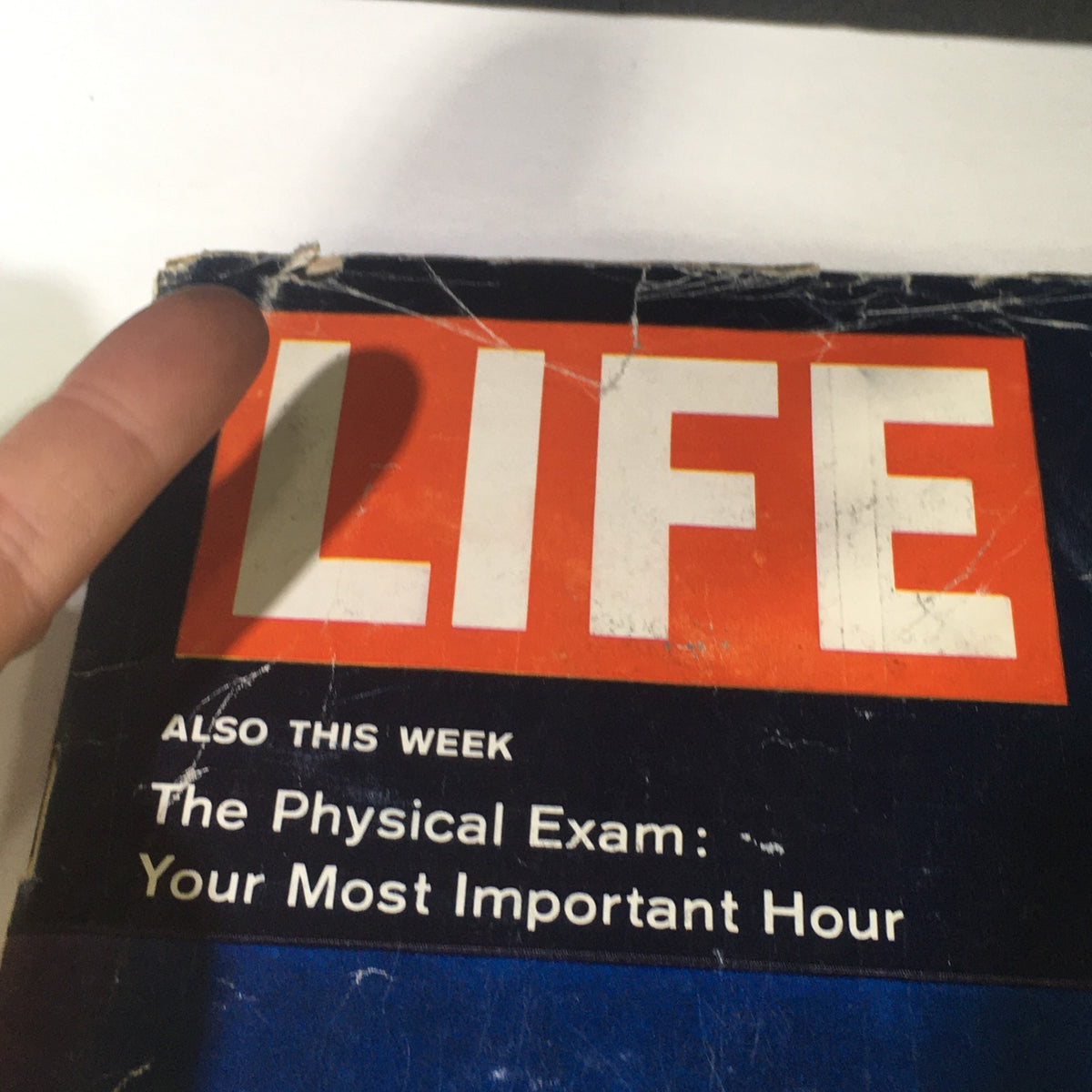 Close-up of the 'LIFE' magazine logo from the October 5 1962 issue featuring Jackie Gleason; offers insights into mid-century American media.
